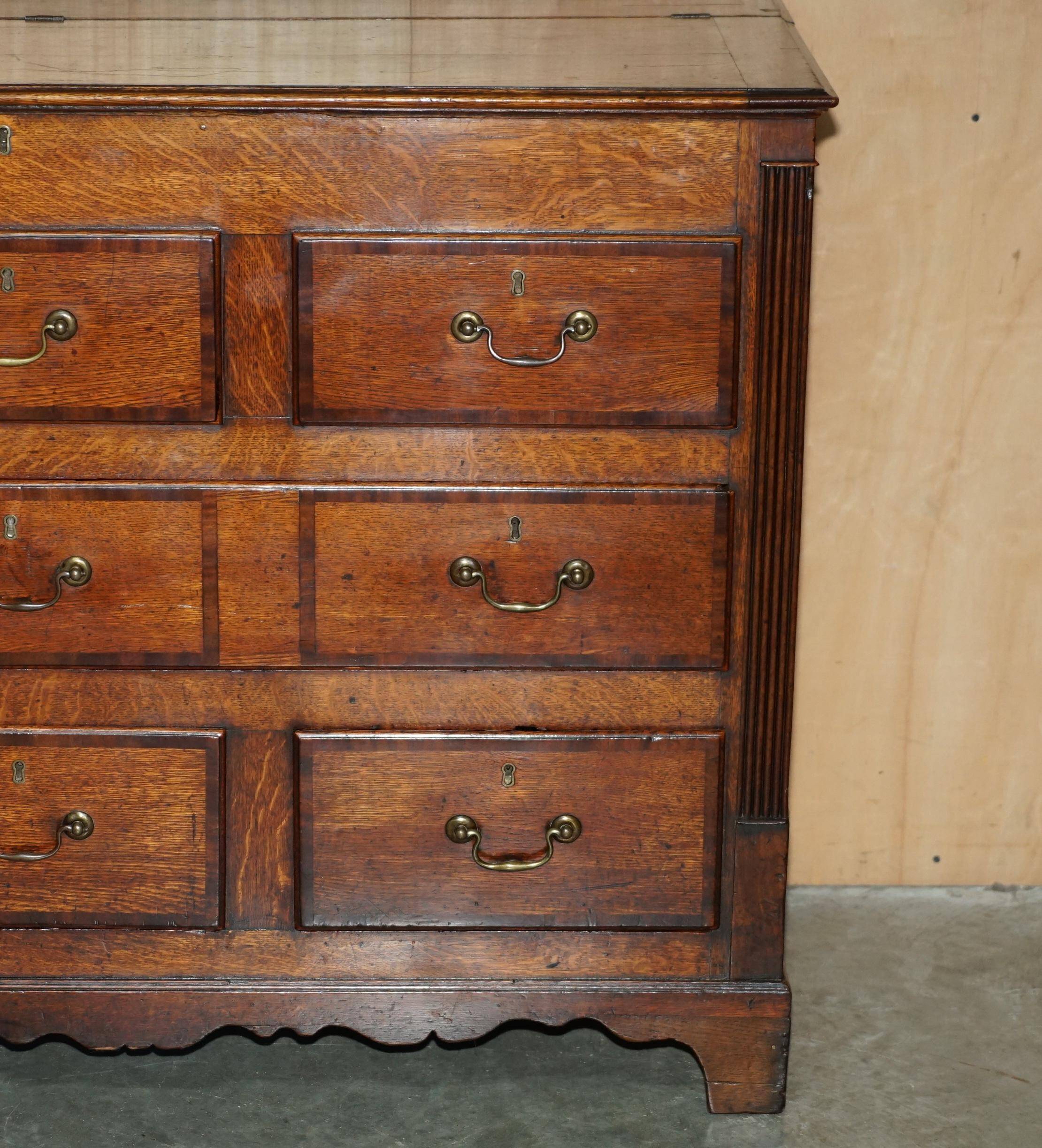Georgian oak commode with a folding top, English, 18th century.