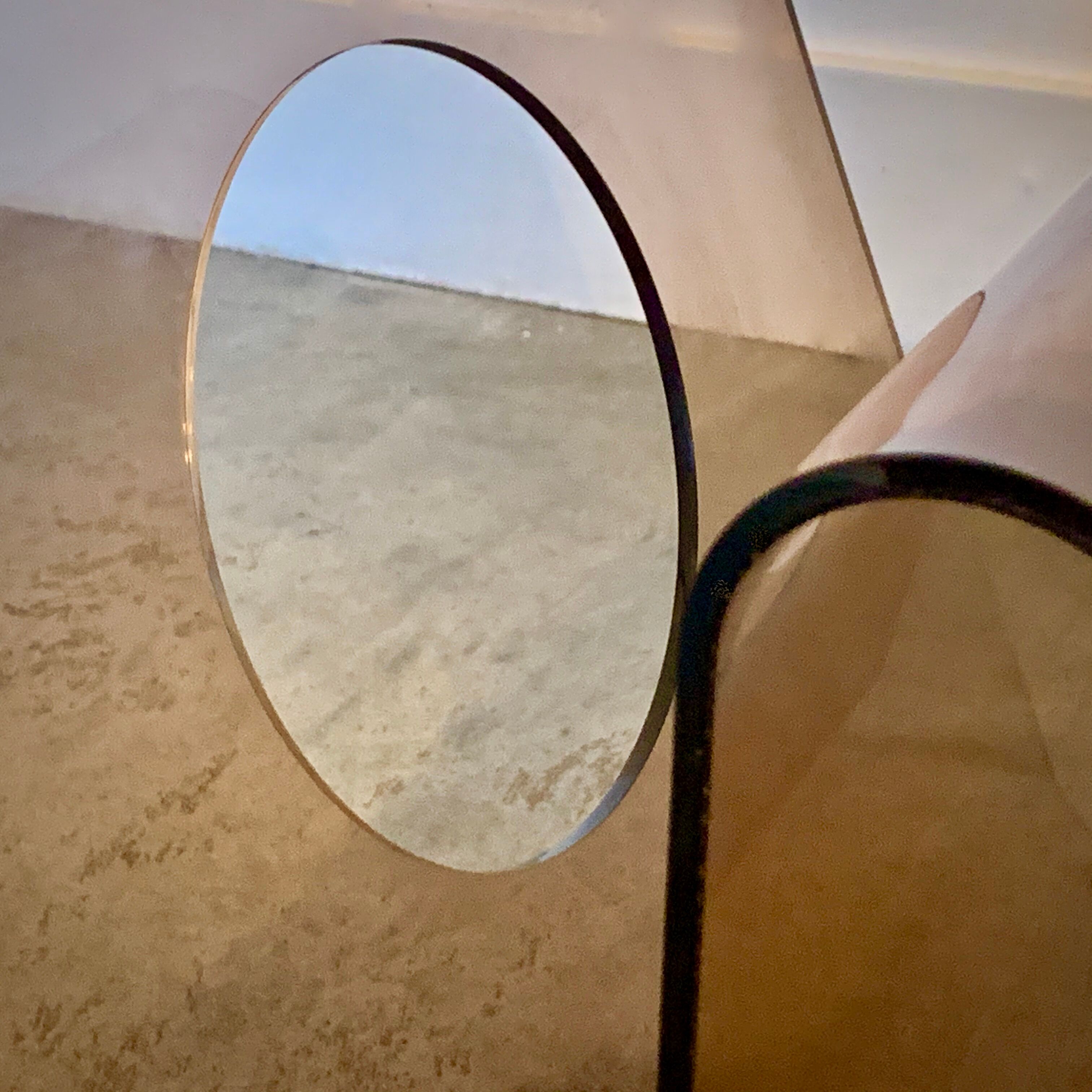 Michel Dumas' magazine rack in smoked altuglas, 1970s