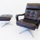 Danish black leather armchair with ottoman 70s