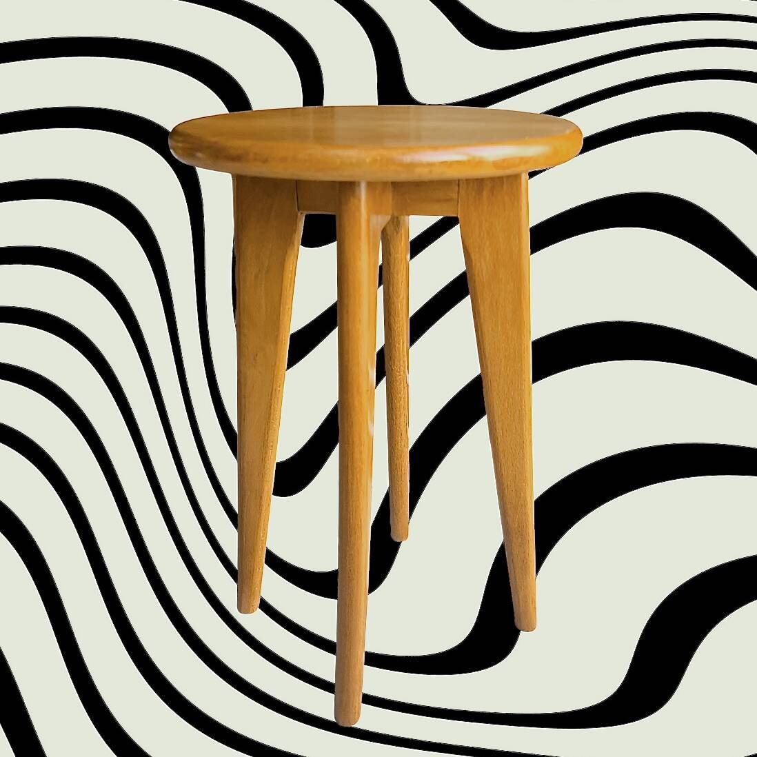 Scandinavian style stool in solid wood, splayed legs, 1960s.
