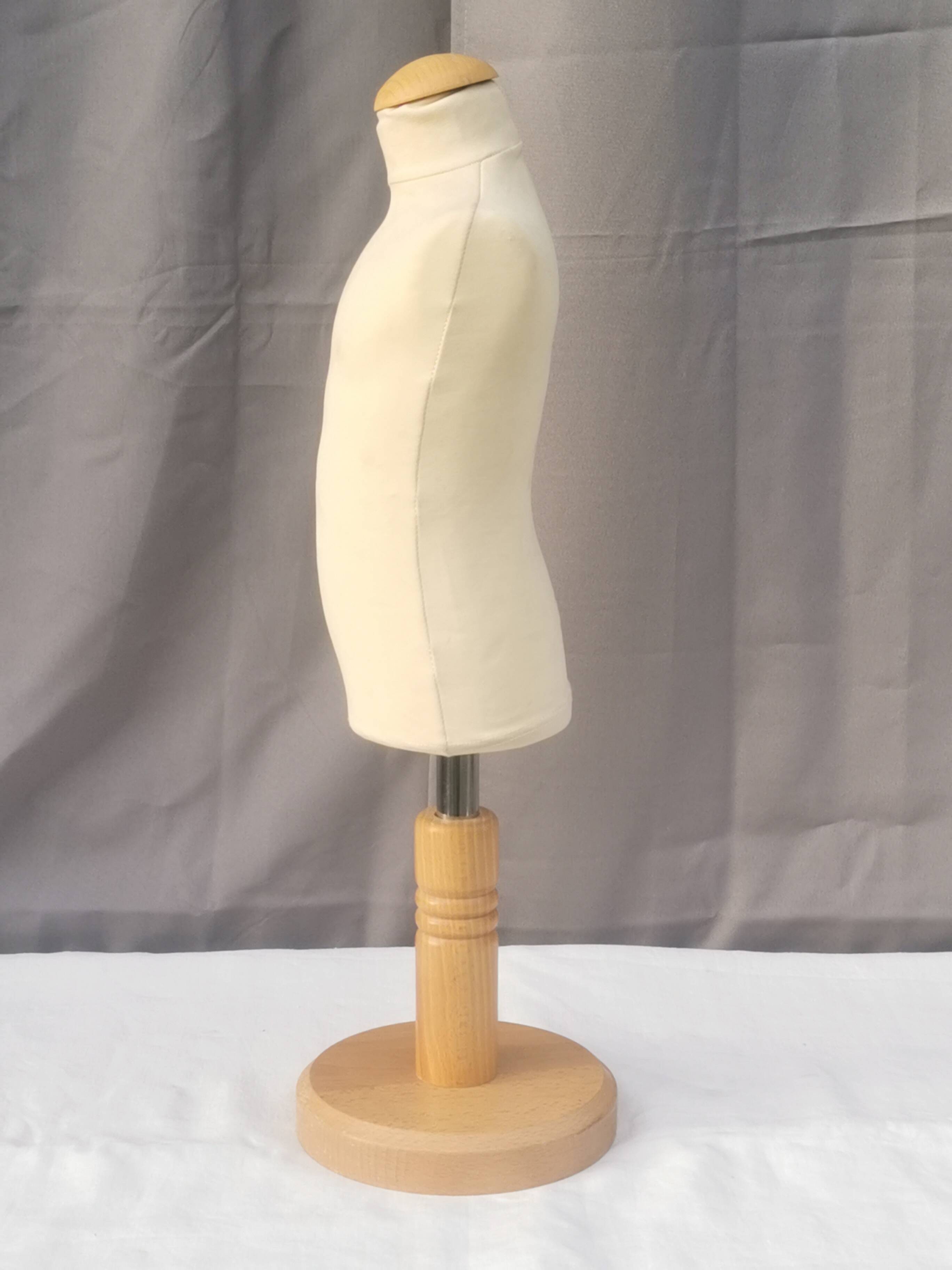 "Child bust" mannequin on base