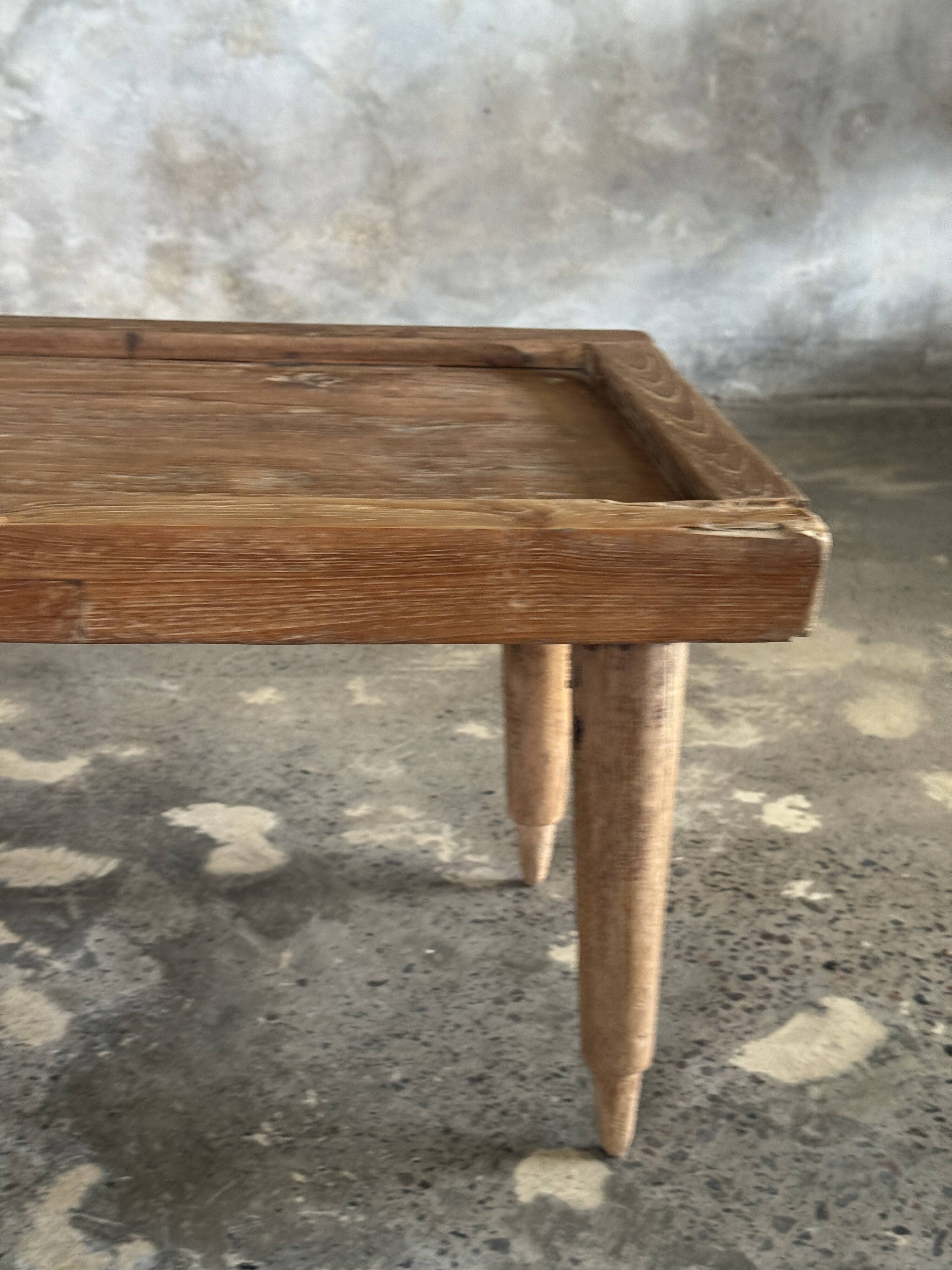 Coffee table with tapered legs in recycled antique teak H35 L104
