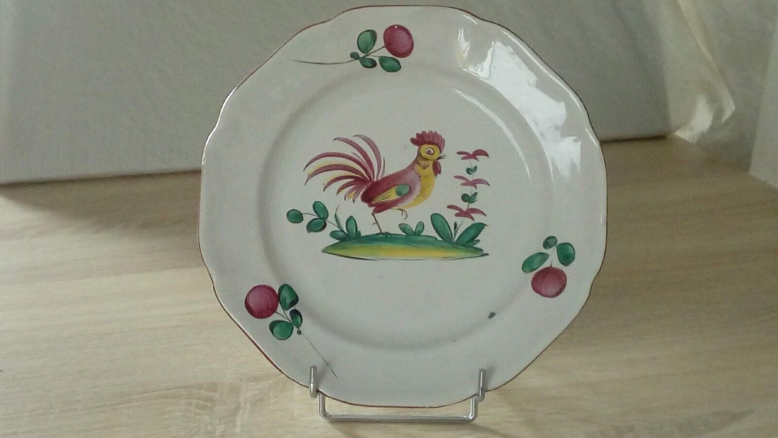 Luneville Saint Clement earthenware plate decorated with rooster late 19th century