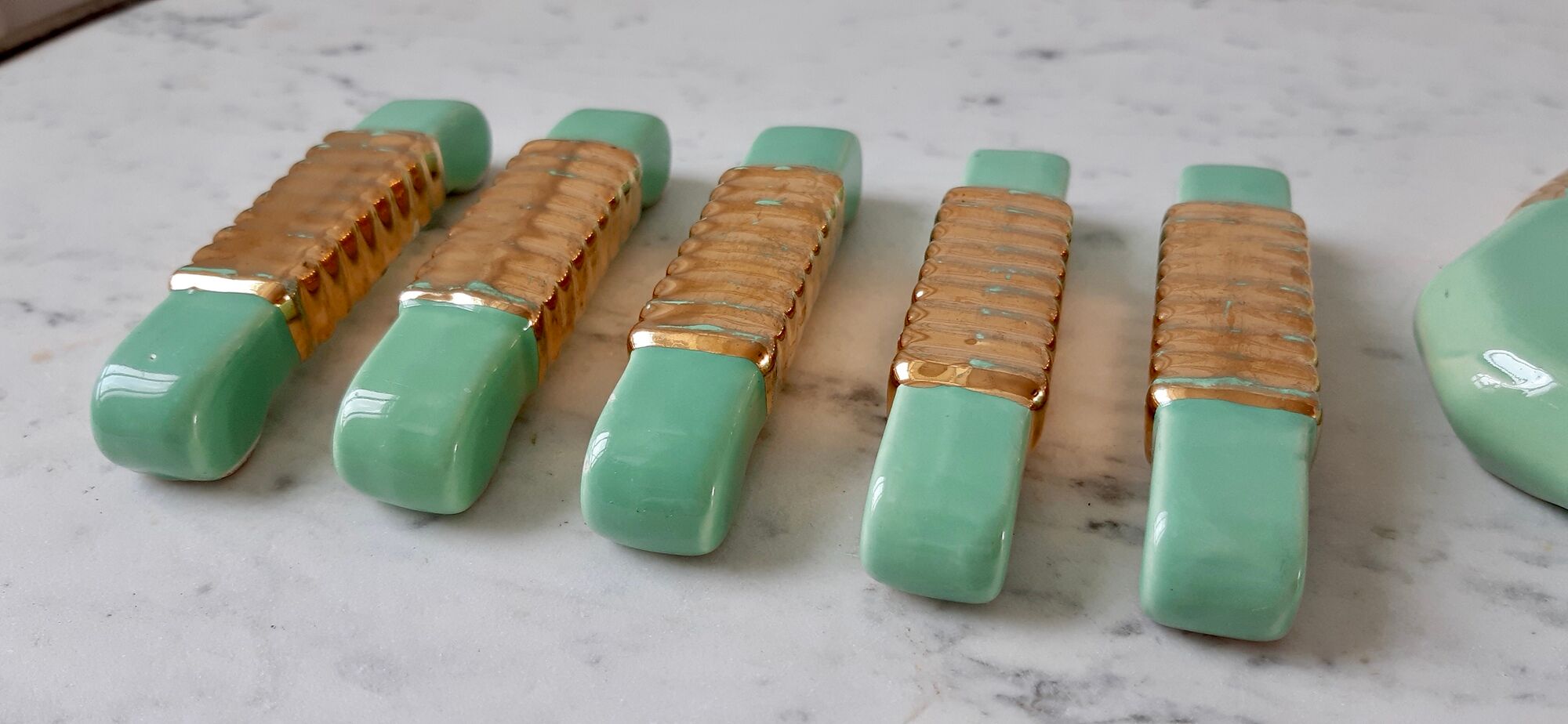 Set of a bottle bottom and 5 knife holders in art deco mint green ceramic