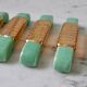 Set of a bottle bottom and 5 knife holders in art deco mint green ceramic