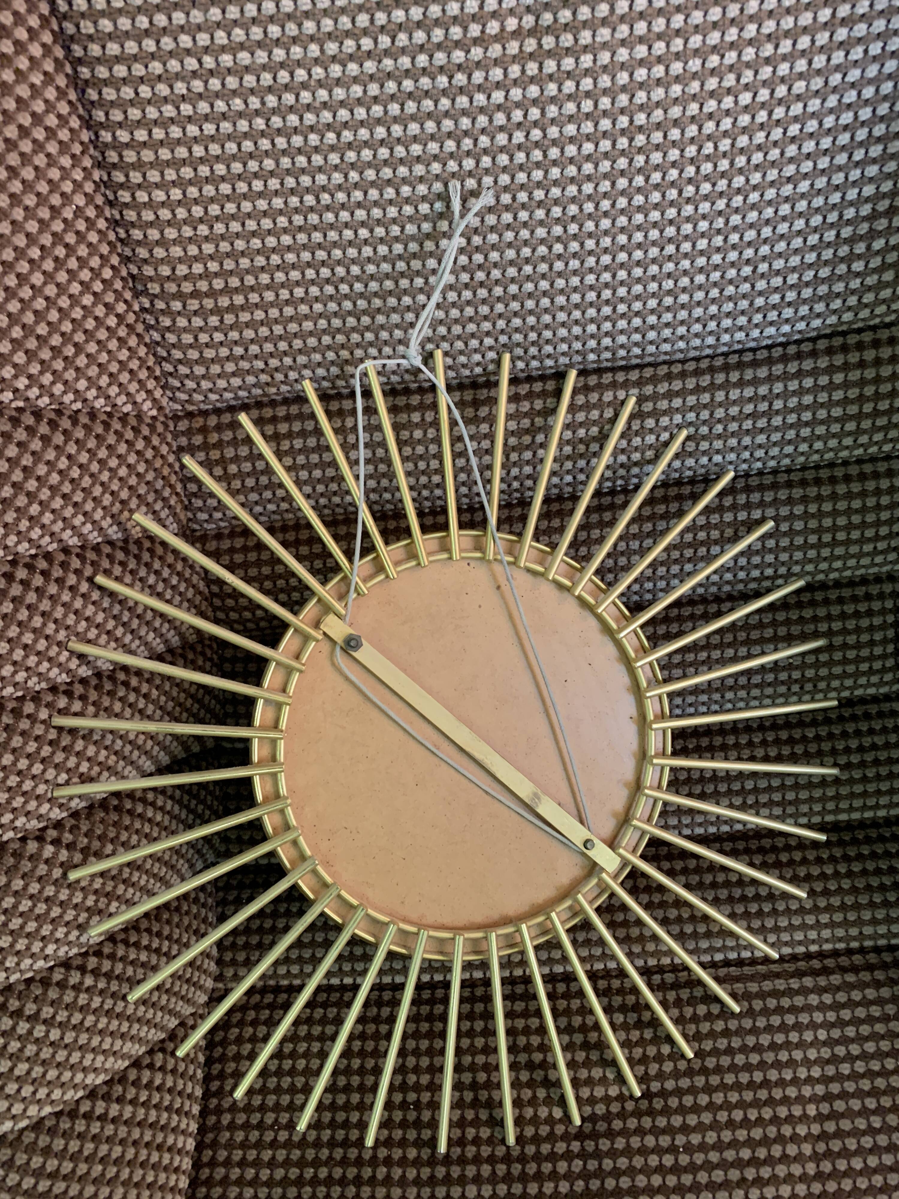 Vintage metal sun mirror