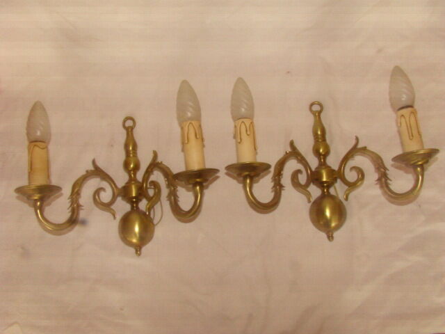 Pair of bronze wall lights with 2 arms in "Dutch" style.