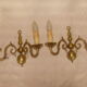 Pair of bronze wall lights with 2 arms in "Dutch" style.