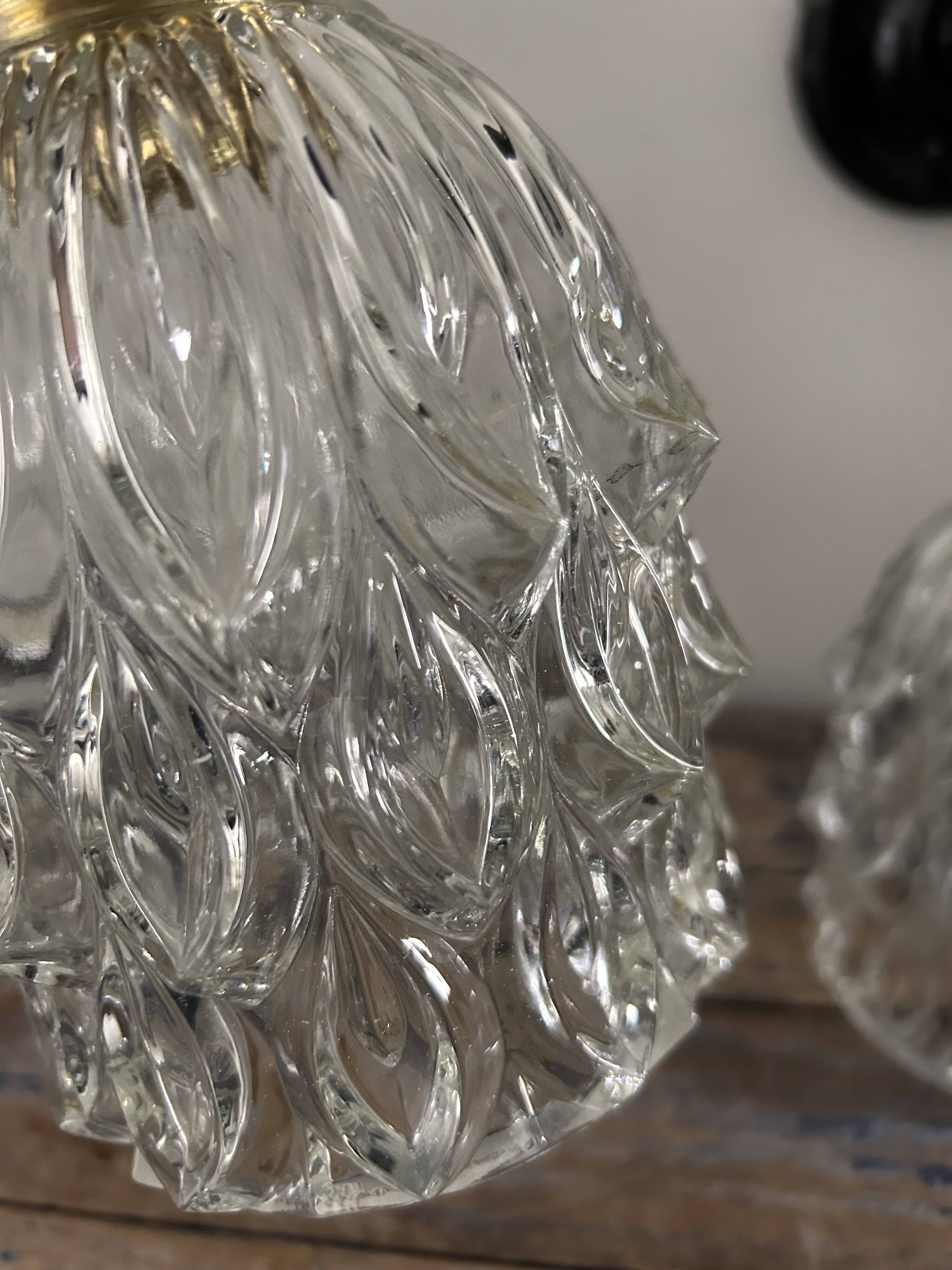 Pair of chiseled glass wall sconces