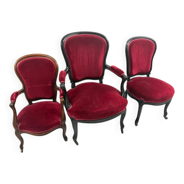 Two armchairs and a Louis-Philippe chair, red velvet.