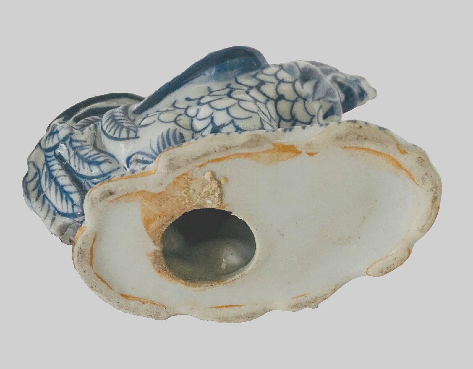 Pair of ceramic roosters in blue camaieu 20th century