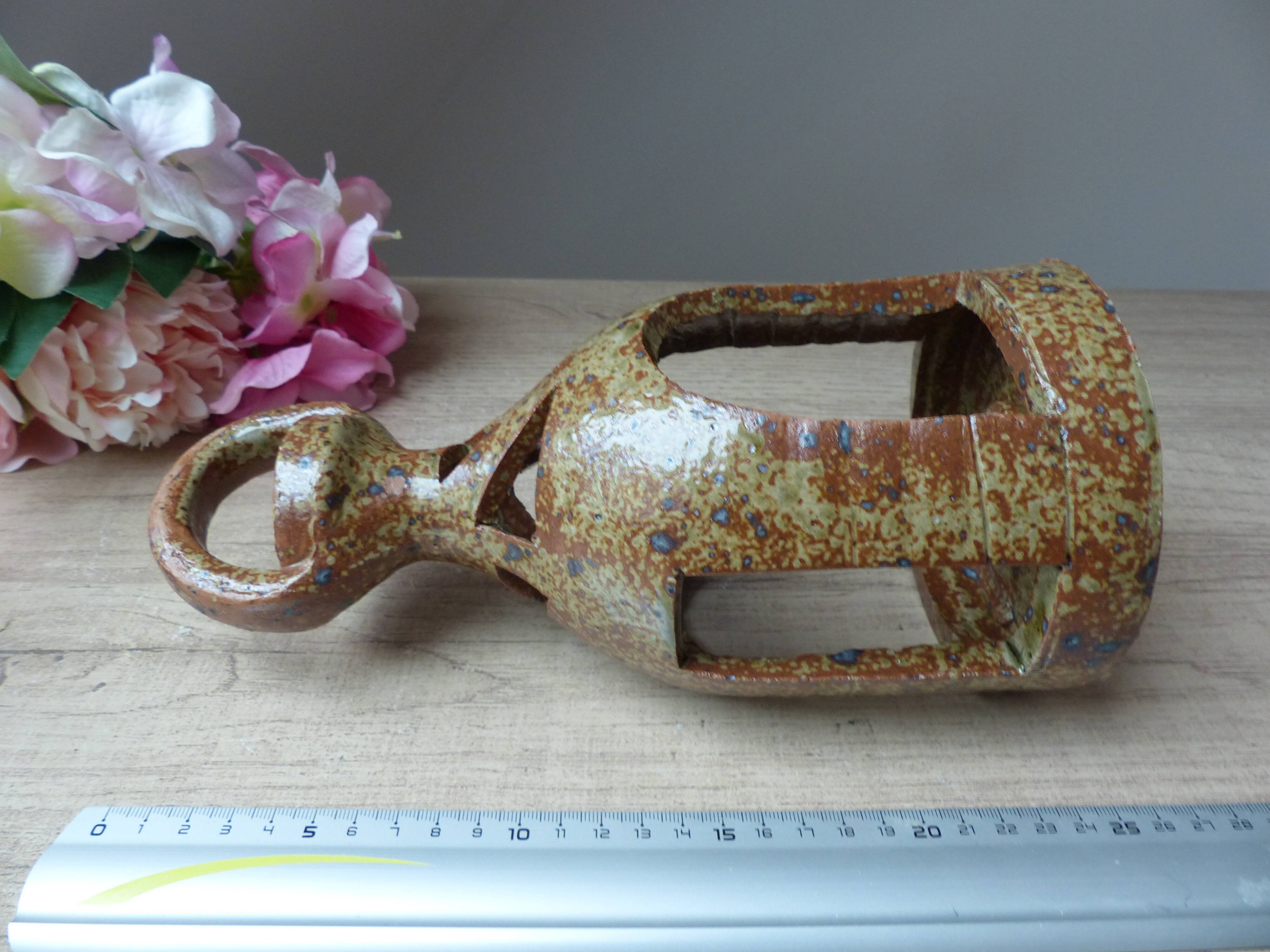 Old candle holder lantern in pyrite sandstone, decorative lantern