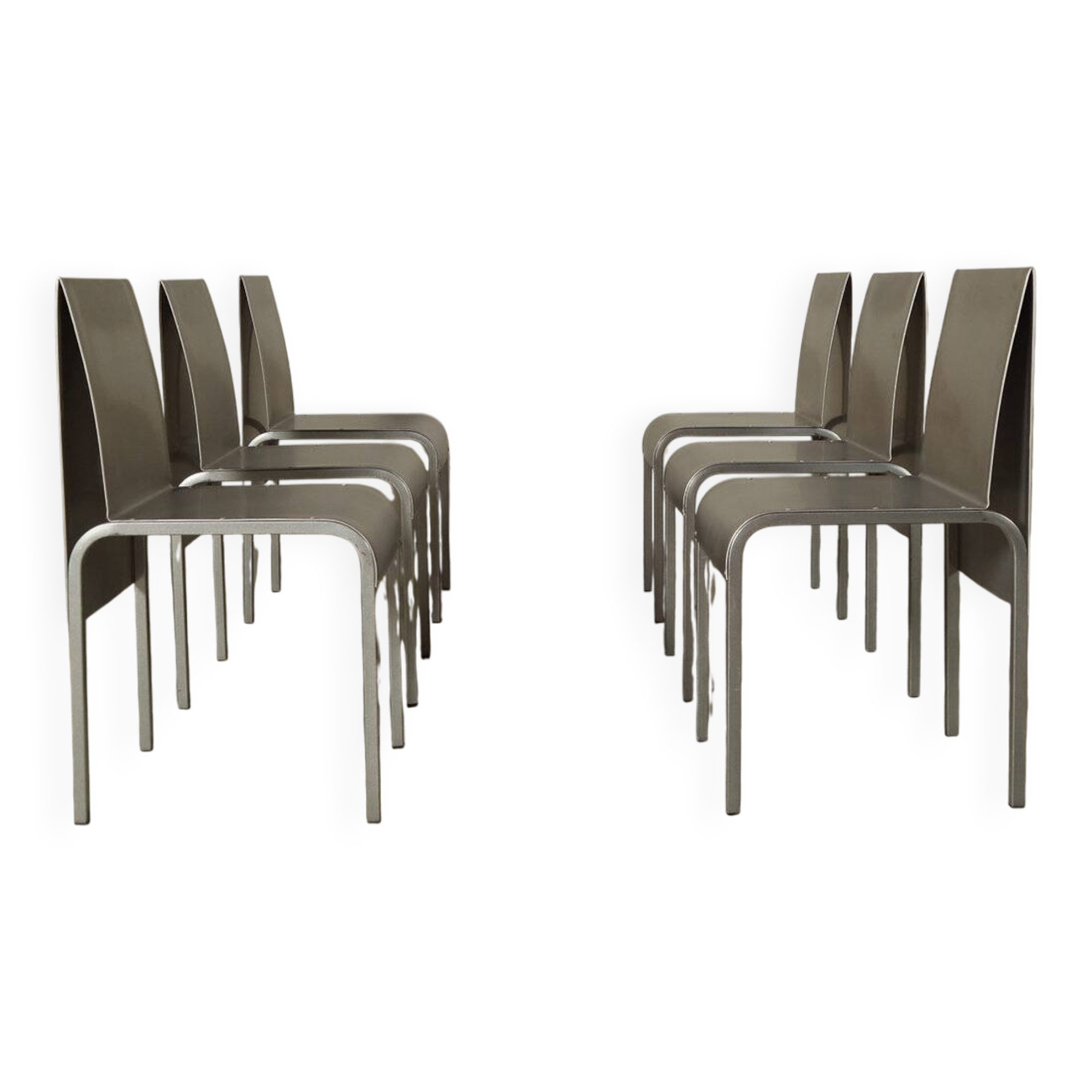 Set of six postmodernist stainless steel dining chairs from circa 1980-1990.