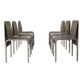 Ensemble de six chaises de salle à manger en acier inoxydable postmodernistes datant d'environ 1980-1990.