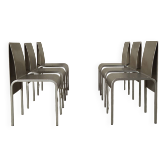 Set of six postmodernist stainless steel dining chairs from circa 1980-1990.