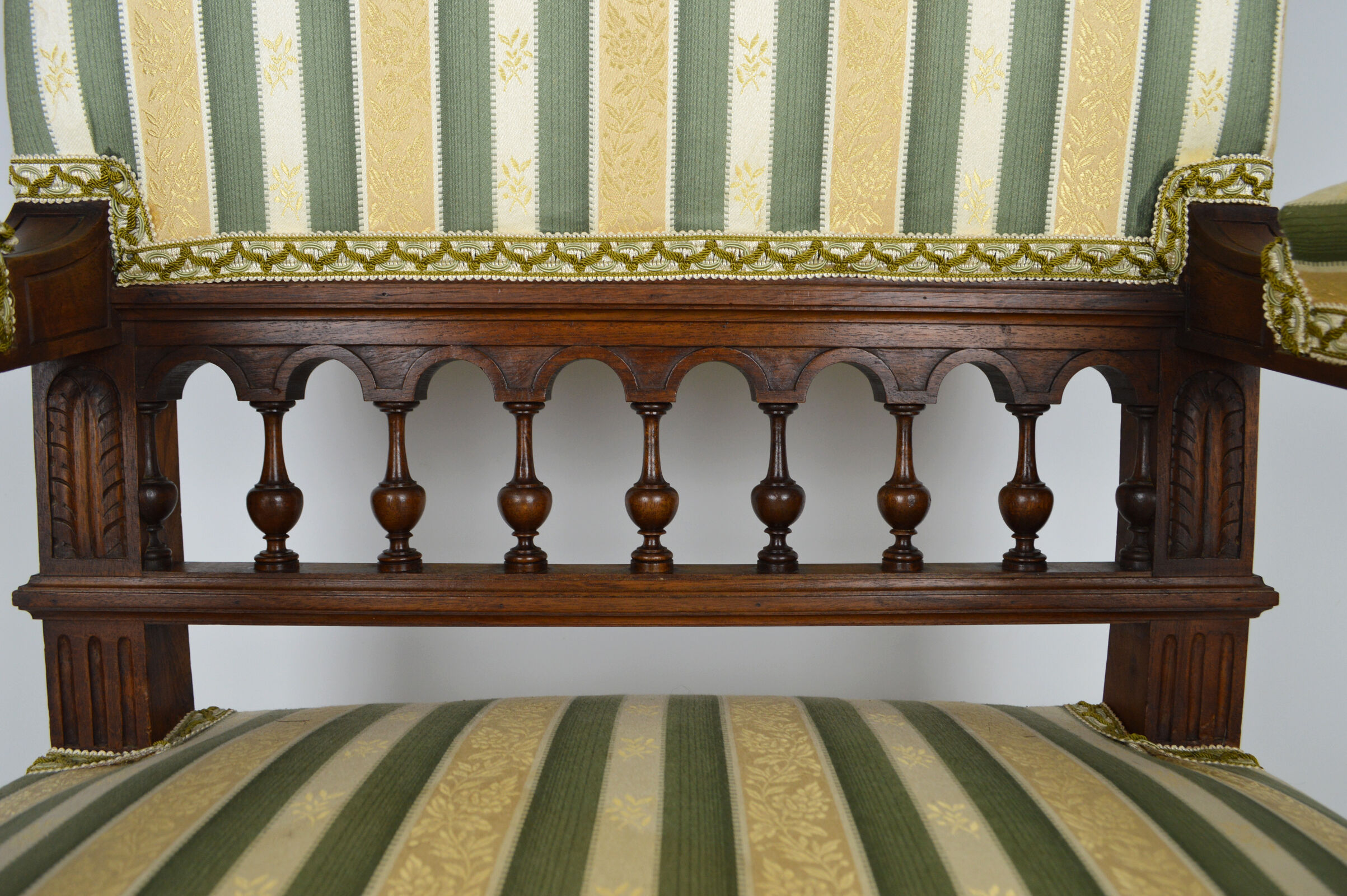 Neo-Renaissance walnut armchair with lion heads, circa 1880