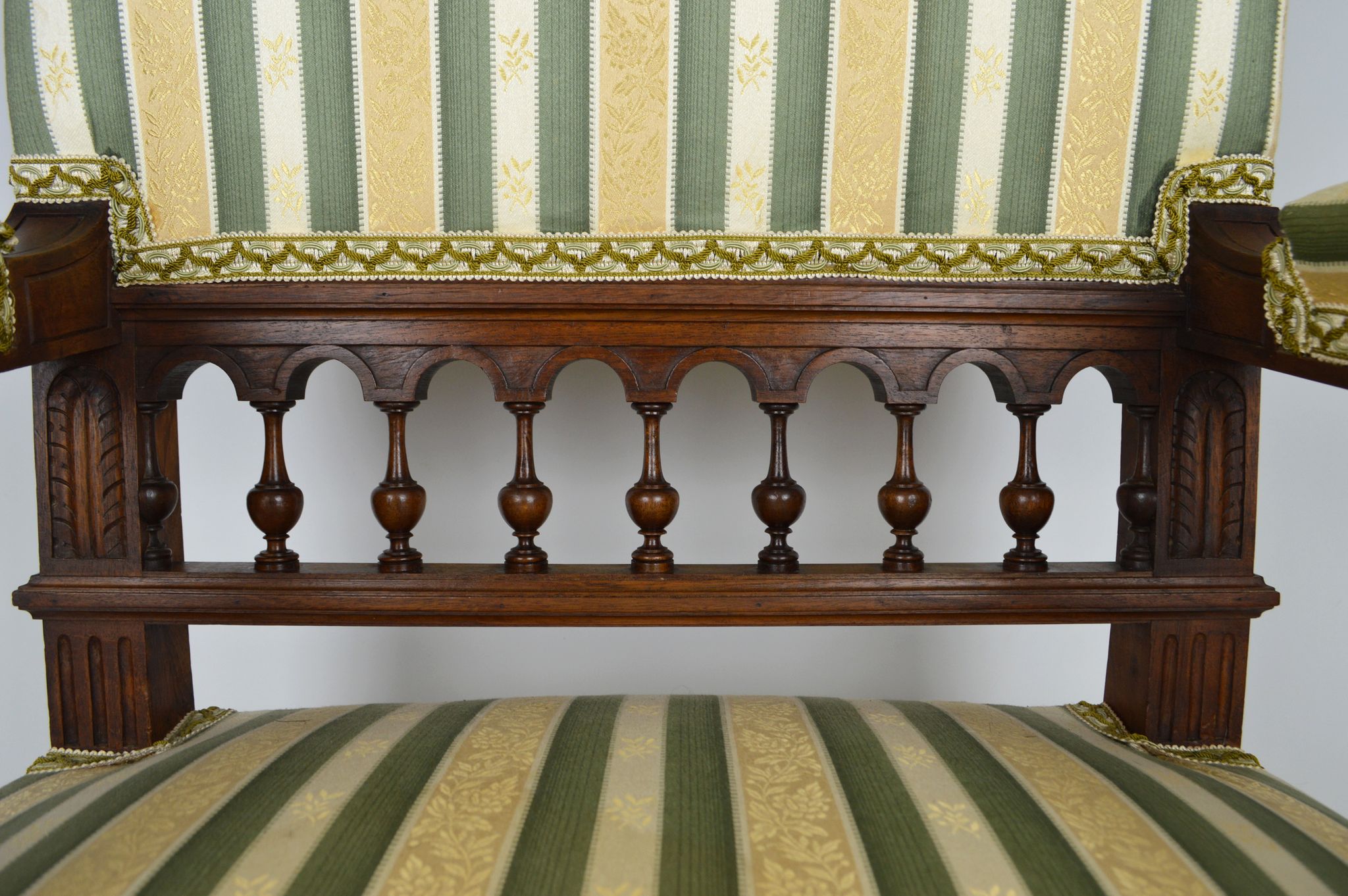 Neo-Renaissance walnut armchair with lion heads, circa 1880