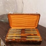 Box of 11 stainless steel knives with bakelite handles