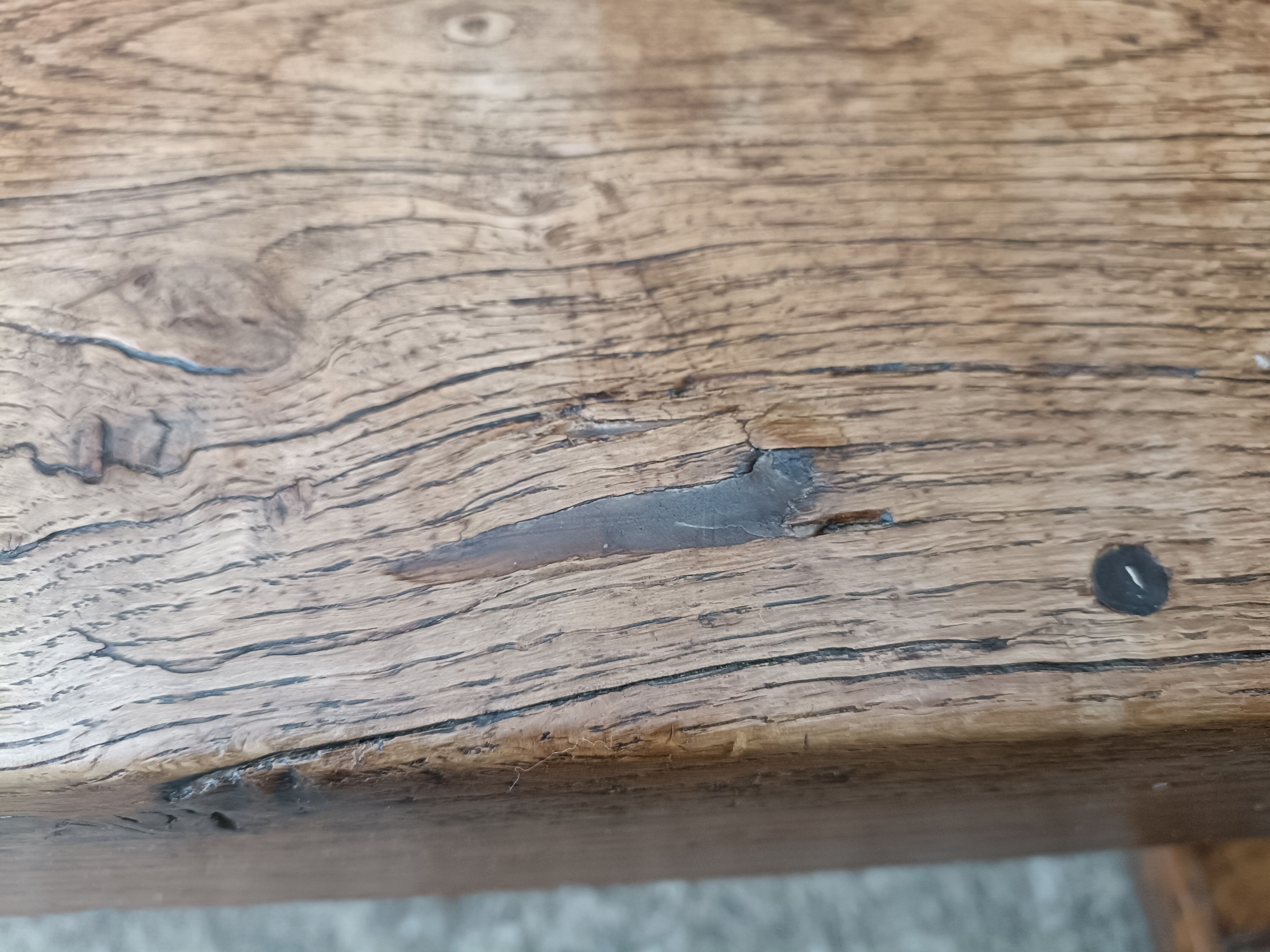 Oak church bench period XVII th century, back decorated with carved parchments