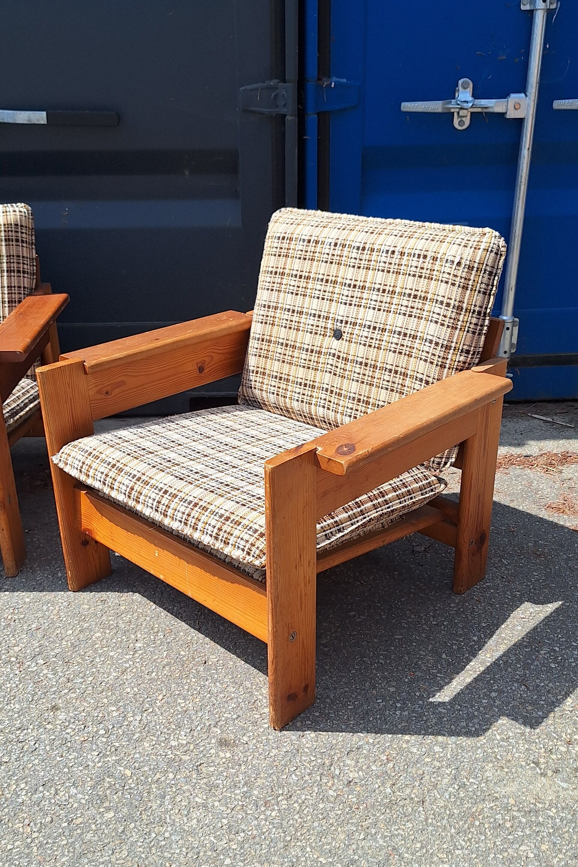 Brutalist-style bench and armchairs in 1970s pine.