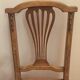Chaises cannées en bois