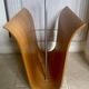 Vintage curved wooden magazine rack by Ligne Roset, 1970s.