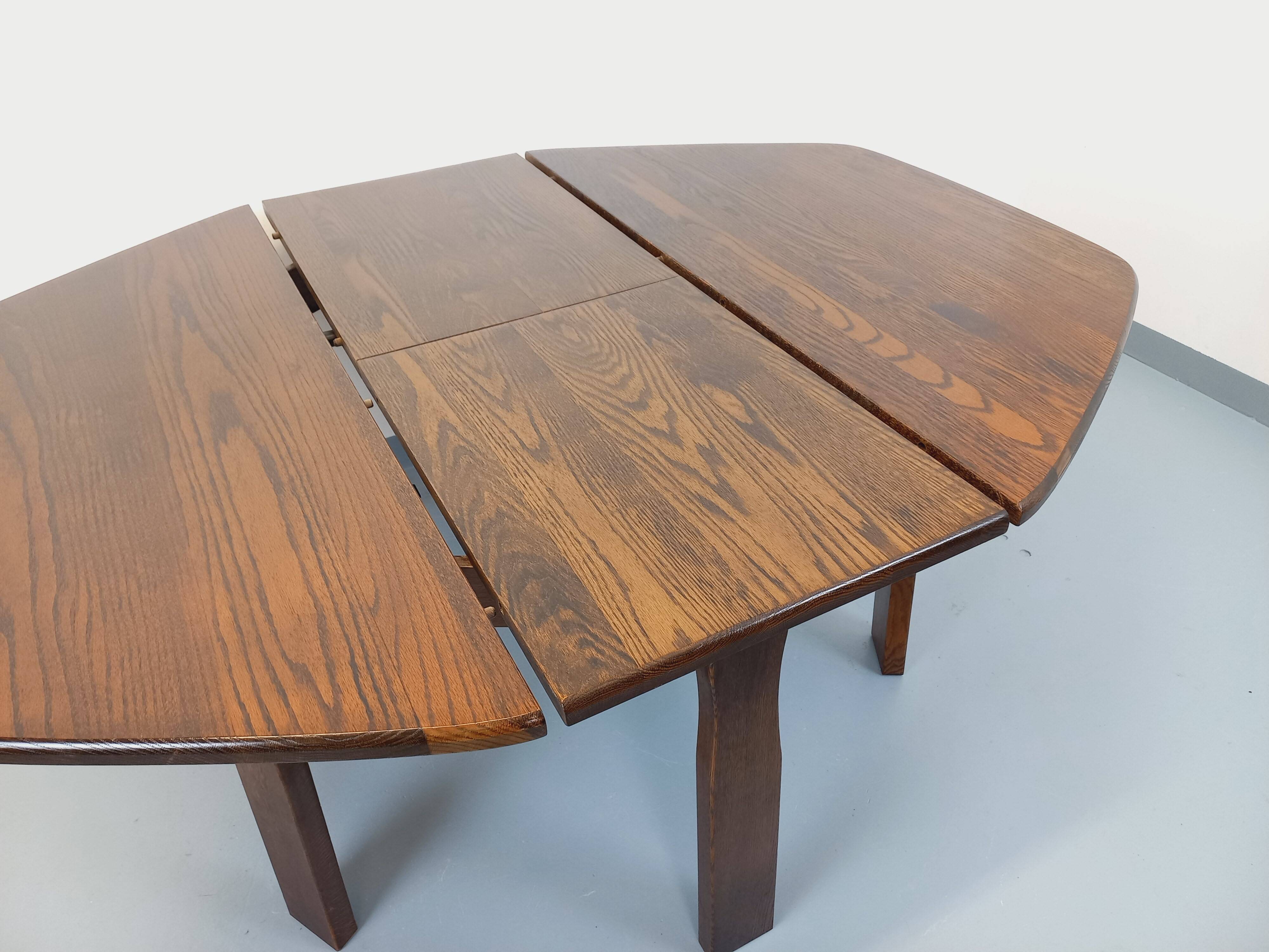 Vintage brutalist hexagonal dining table made of oak from the 1950s.