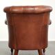 Cognac-coloured cow leather Chesterfield armchair in English style