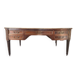 Grand bureau plat de style Louis XVI en acajou, début XXe siècle