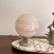 Antique Art Deco table lamp in marble and pink glass featuring a deer.