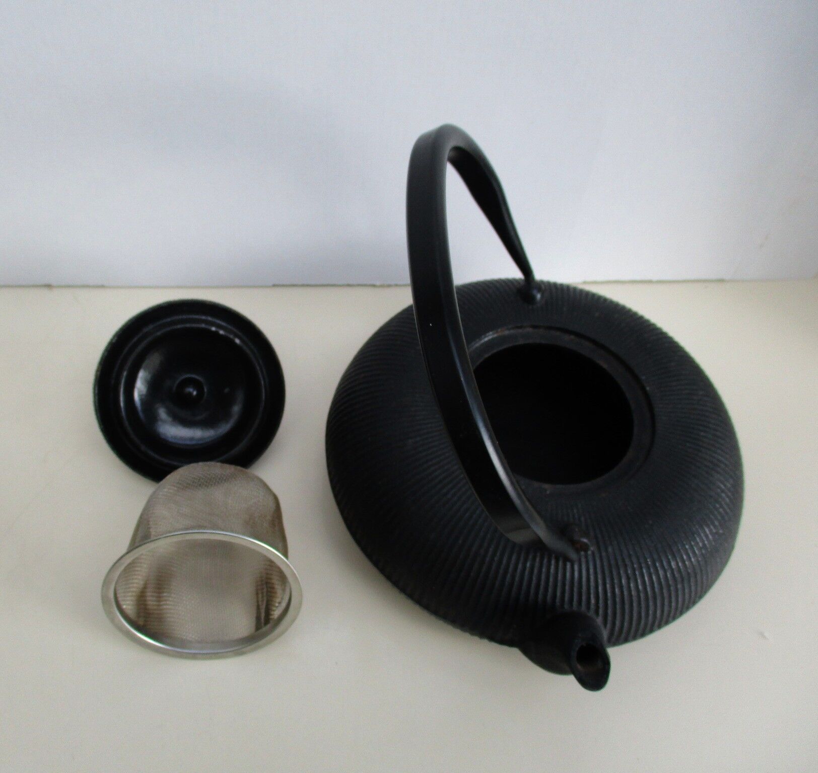 Asian teapot in black cast iron