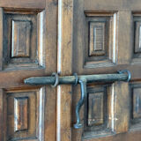 Antique Spanish wardrobe with three sections — carved drop front & wrought iron