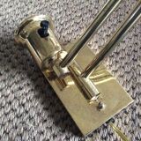Wall lamp in gold metal