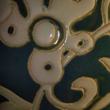 Blue water vase with white floral pattern