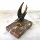 Marble swallow and brass paperweight