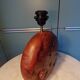 Lamp in elm or thuja wood.