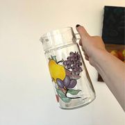 Vintage glass carafe with painted fruits