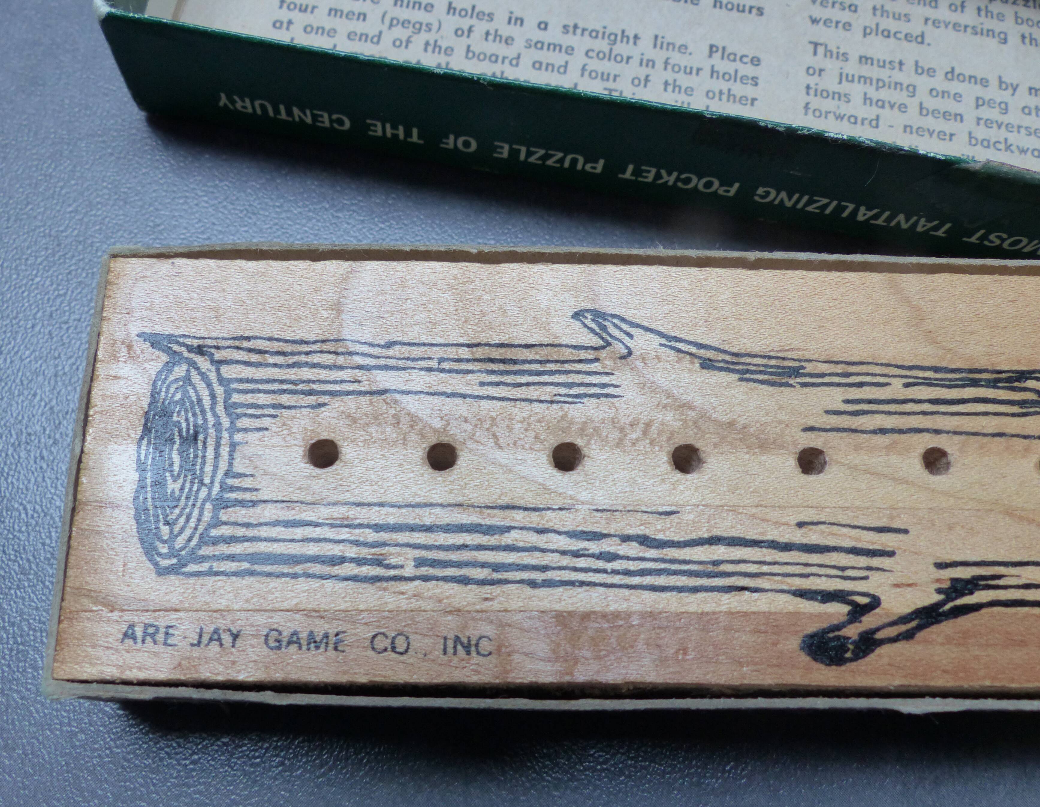 Wooden game "8 men in a log"