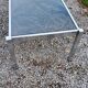 Coffee table from the 70s chrome and smoked glass