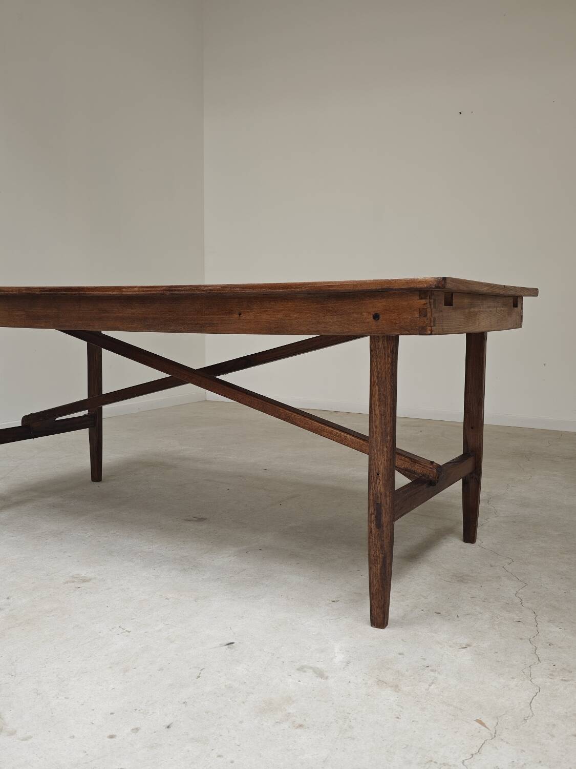 Vintage workshop folding table in oak with a hand-patinated black top.