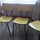Ensemble vintage en formica jaune : table + 4 chaises+ 1 tabouret 1960/70
