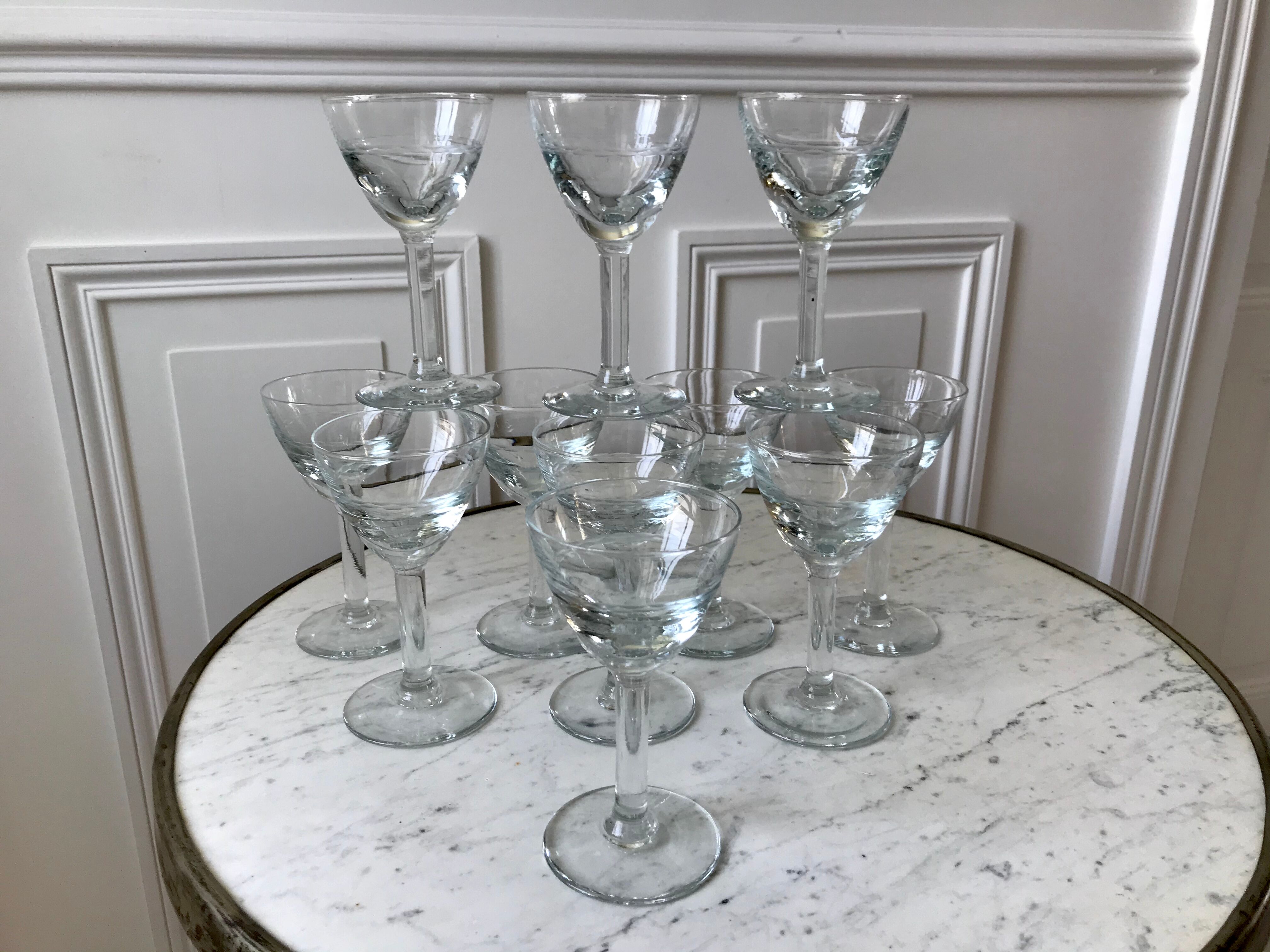 Set of 11 molded glass wine glasses engraved 20s