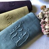 Suite of four tinted antique napkins