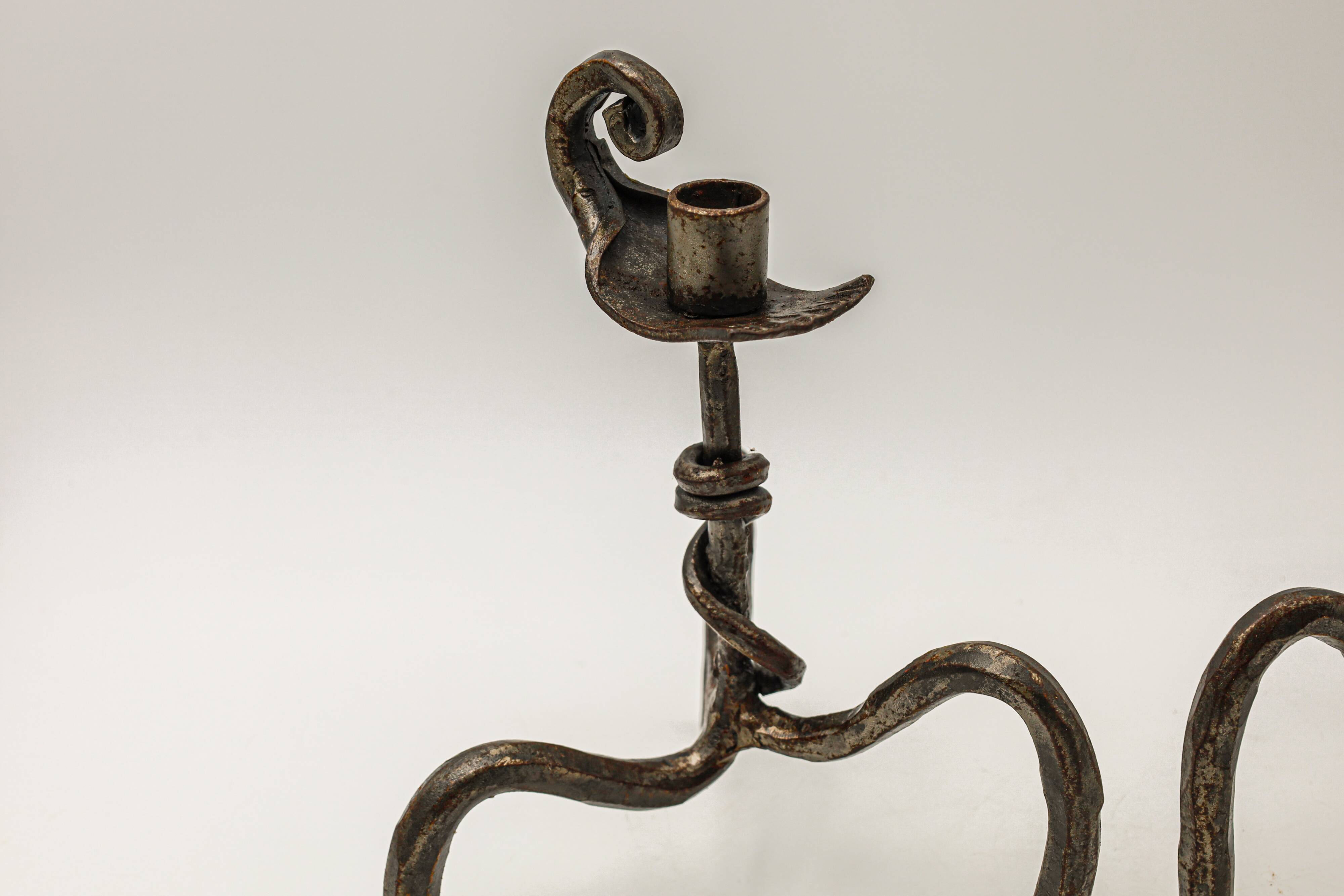 Pair of brutalist wrought iron candlesticks, French work, 1950s-1960s