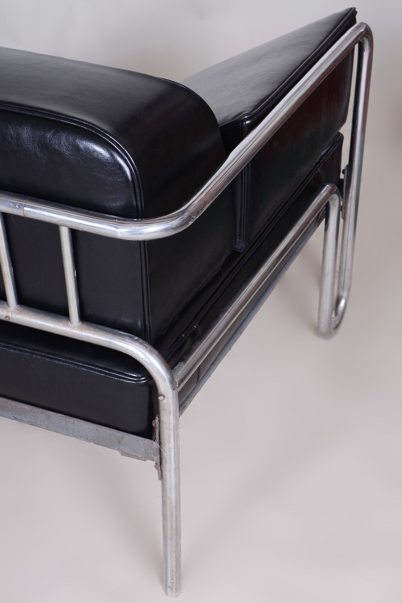 Restored black bauhaus sofa, high-quality leather, chrome-plated steel, 1930s