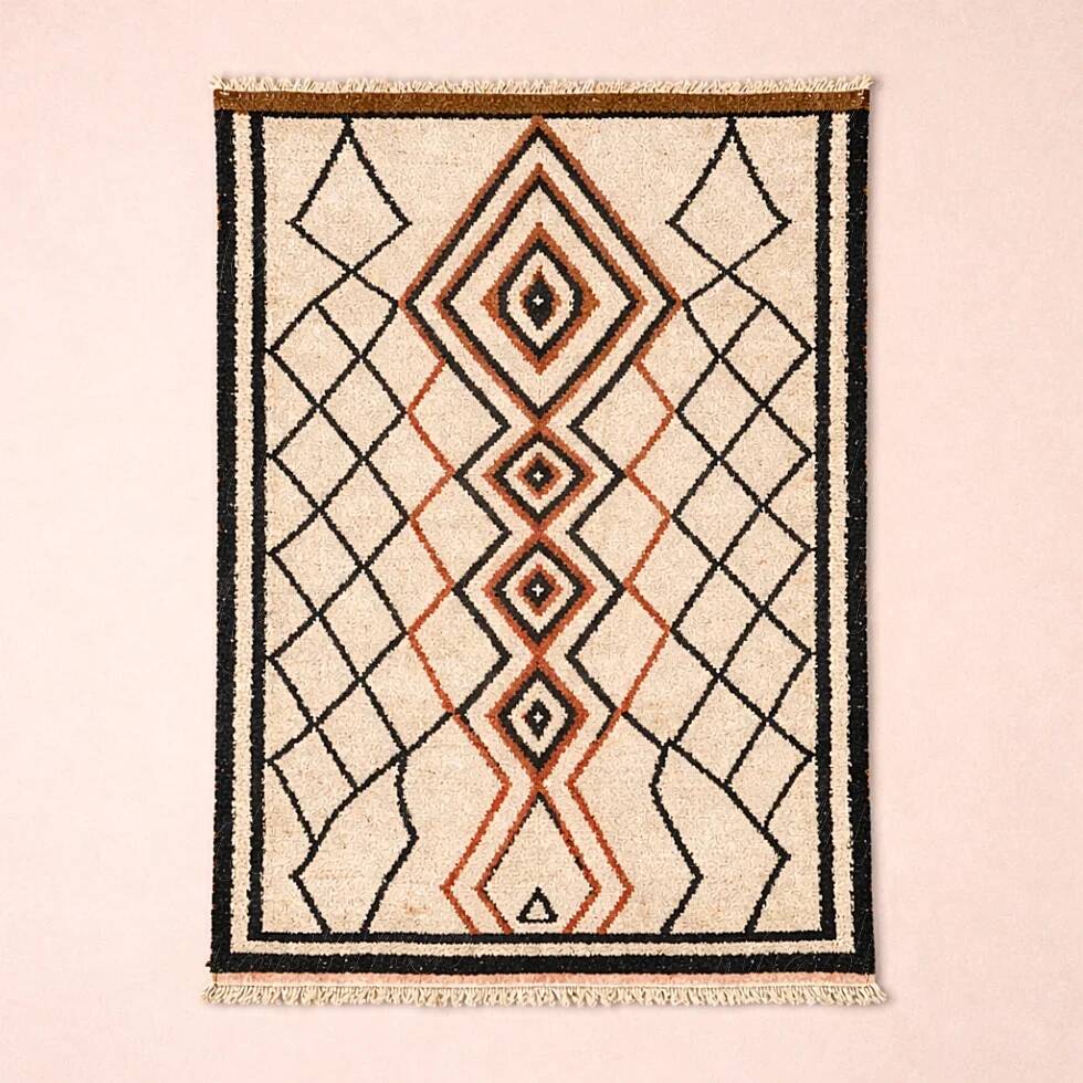 Ecru Berber rug with diamond patterns in structured Atlas style.