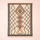 Ecru Berber rug with diamond patterns in structured Atlas style.