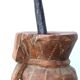 African mortar in carved wood, cast iron pestle, 70s