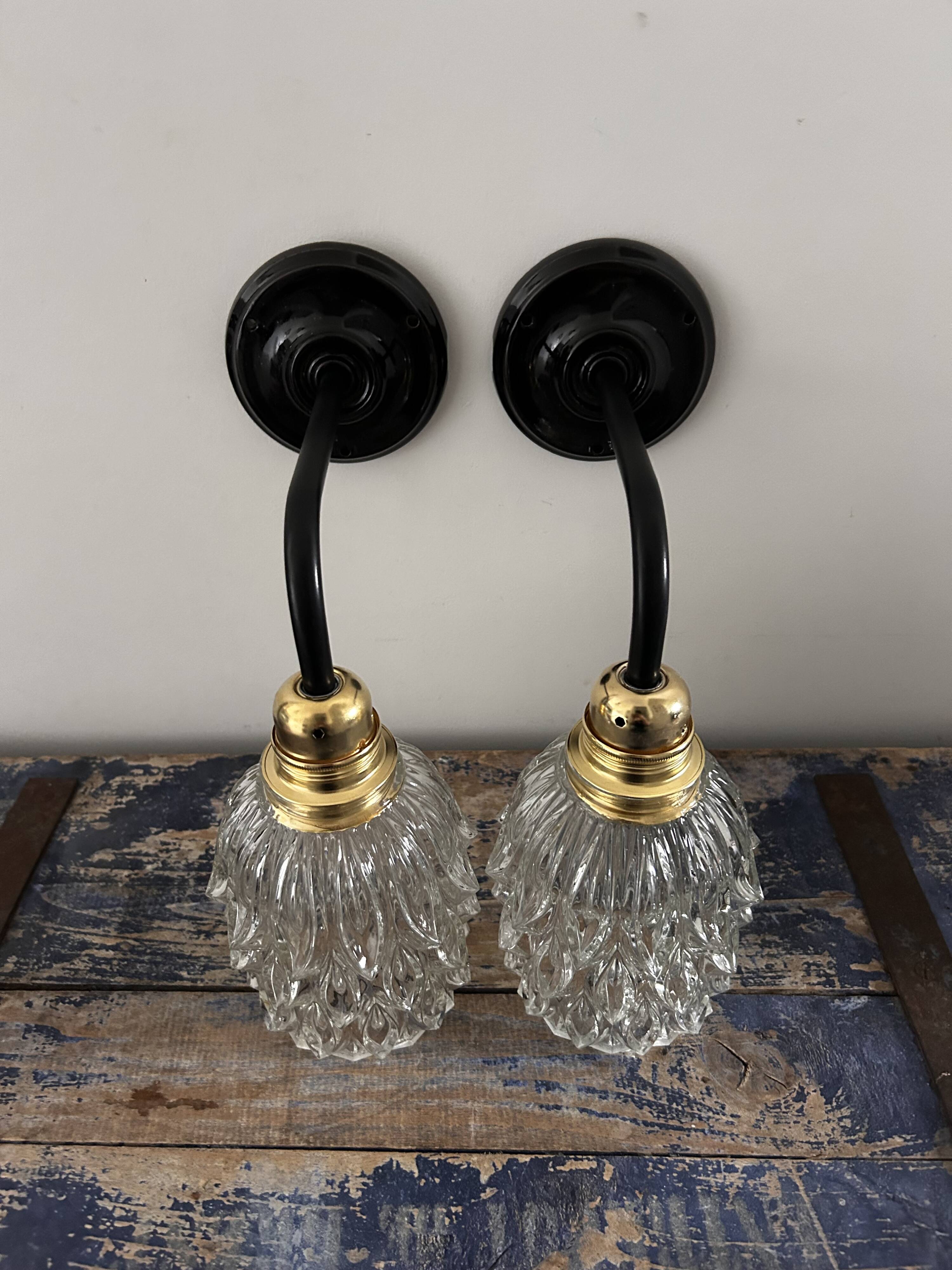 Pair of chiseled glass wall sconces