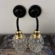 Pair of chiseled glass wall sconces